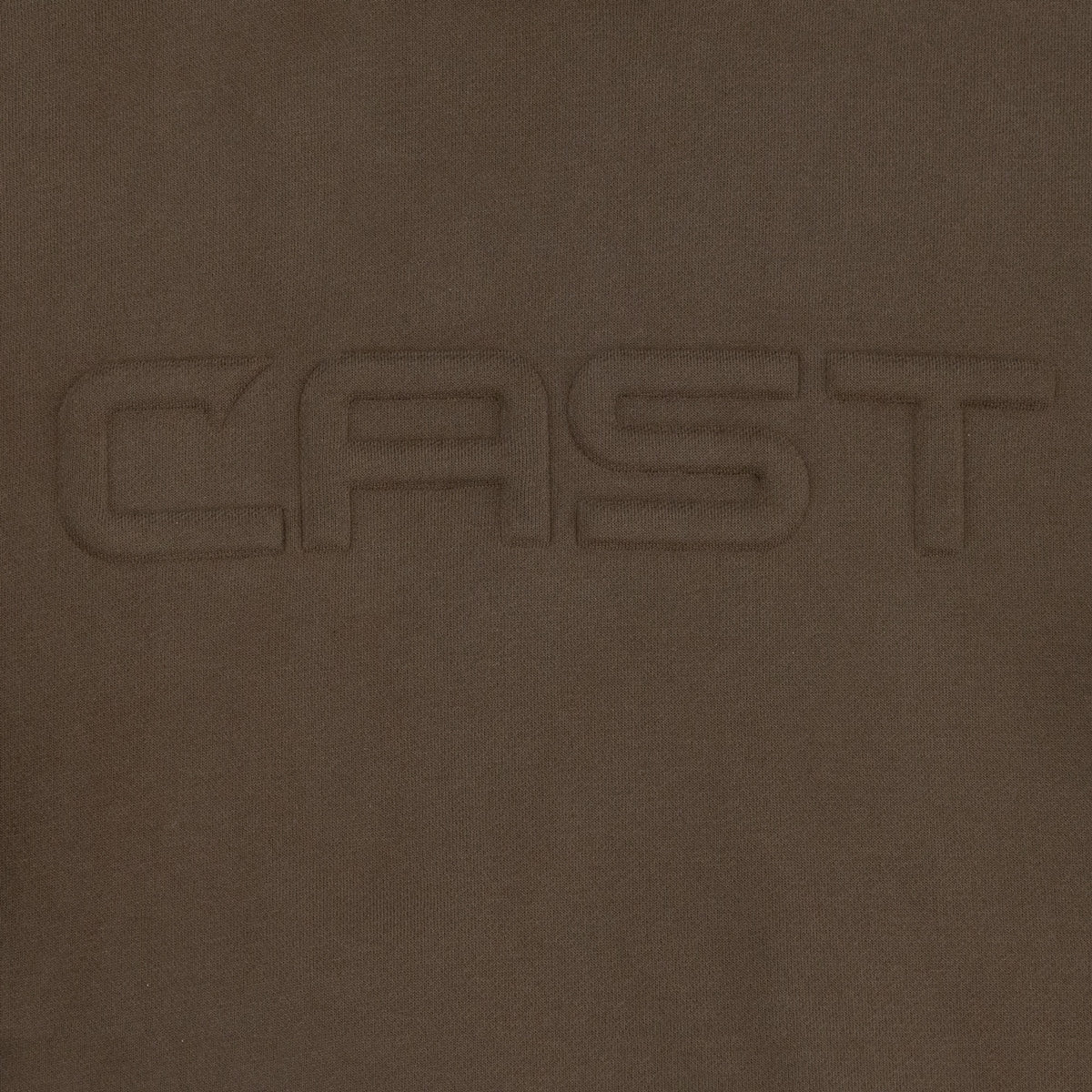 Tone-on-tone puffed CAST emboss on the Lake Mud Reel Heavy hoodie